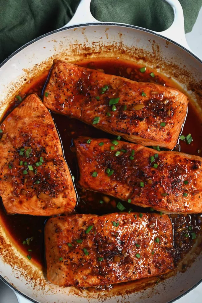 Ready in less than 30 minutes, this one-pan, restaurant-quality honey glazed salmon produces exquisitely delicate, flaky salmon fillets covered in a sticky, sweet-savory glaze!