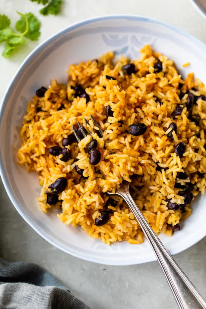This dish for Black Beans and Rice is very tasty and simple to make! made with long-grain rice, canned black beans, and sofrito.