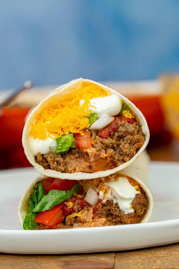 One of the greatest menu items at Taco Bell is the Taco Bell Burrito Supreme (Copycat), which is simple to prepare at home. with cheddar cheese, red sauce, meat, and beans.